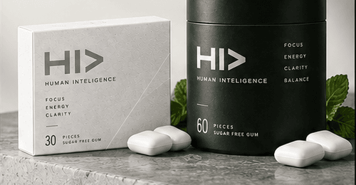 HI> nootropic gum — Clean Mint box and Spearmint tin on a stone ledge